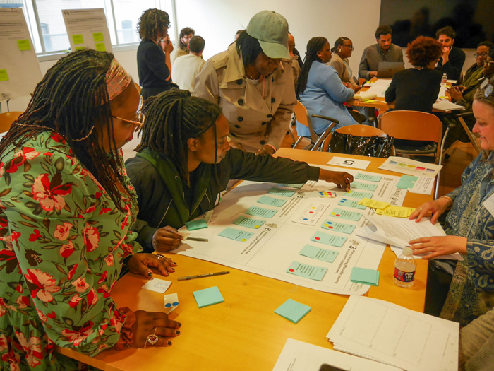 photo of Black women at a workshop session